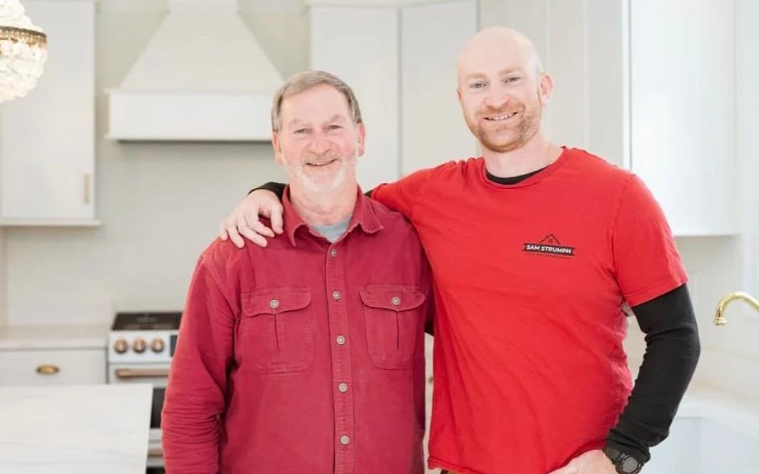 Sam Strumph Builders father-and-son team in a finished custom kitchen in the Greater Portland area